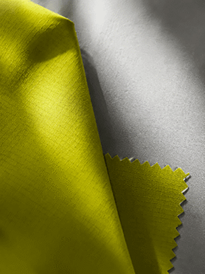 20D Mechanical Stretch Grid Fabric with High-Breathable TPU clear Lamination + 30D Poly Mesh.